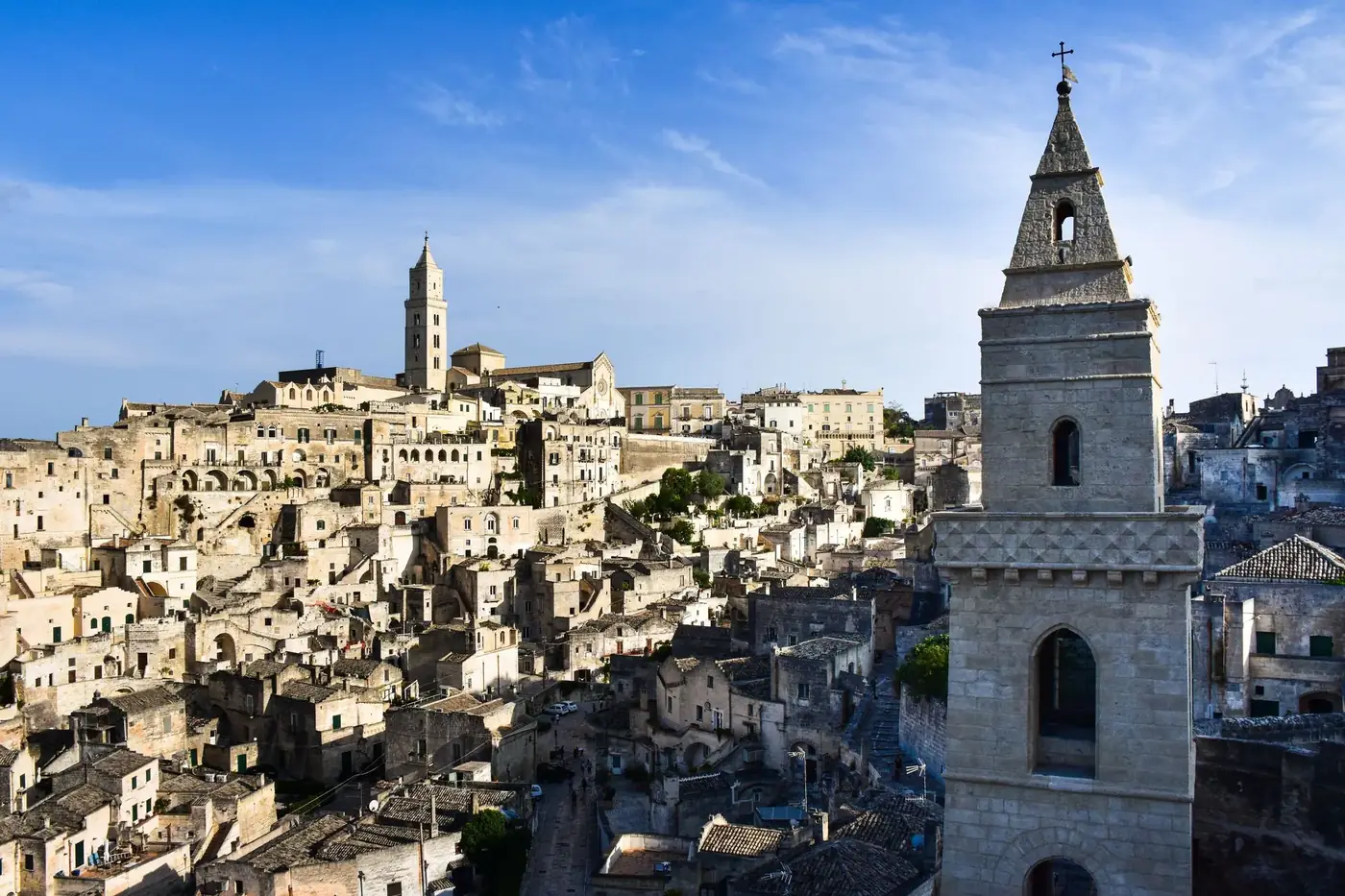 A stunning view of the historic cityscape of Matera, Italy, showcasing ancient architecture.