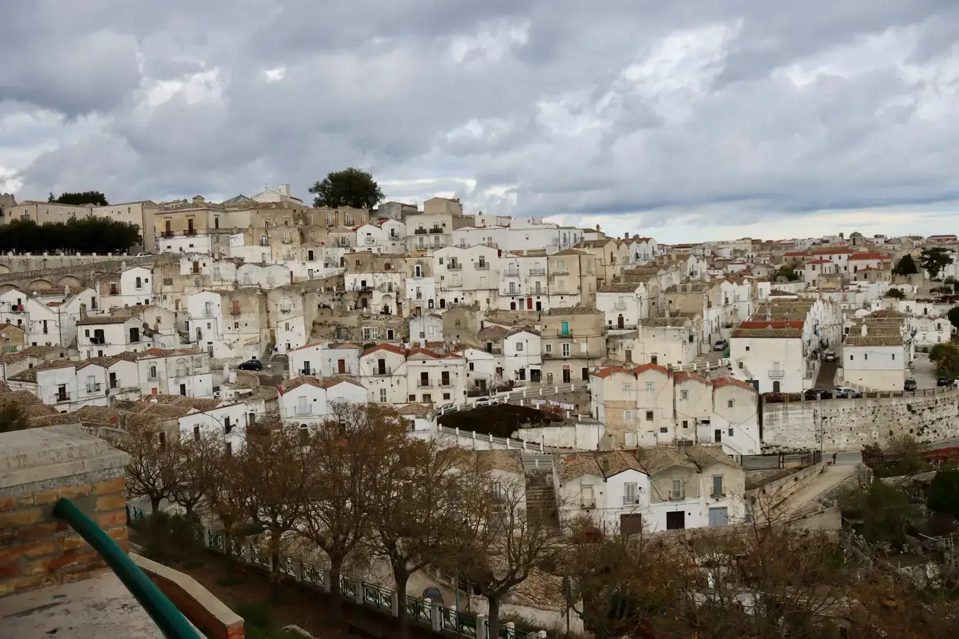 A panoramic view of the charming whitewashed architecture in Monte Sant'Angelo, Puglia, Italy.