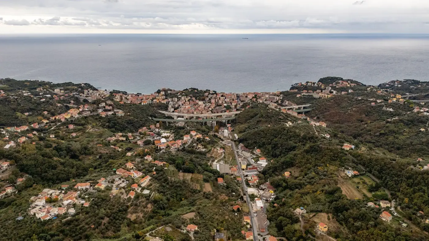 Discover the picturesque landscape of Gameragna, Liguria, Italy with a stunning aerial view of the village and coastline