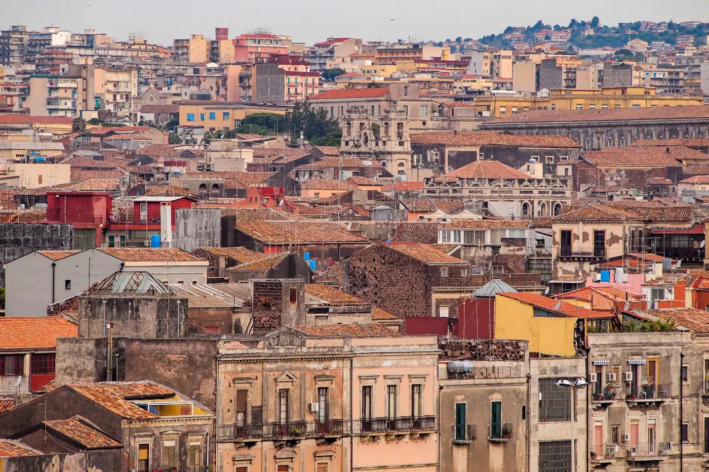 A vibrant aerial view of a historic cityscape with diverse architecture and colorful buildings.
