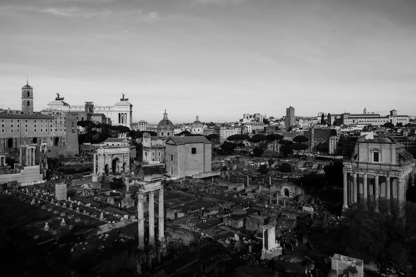Stunning black and white aerial view of the Roman Forum, capturing the timeless architecture of ancient Rome.