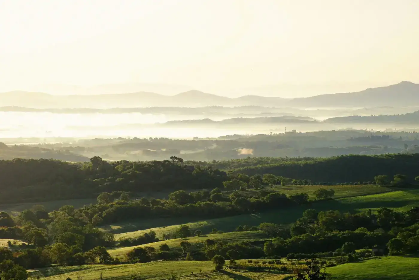 Stunning aerial landscape view of Chianciano Terme, Tuscany with misty hills.