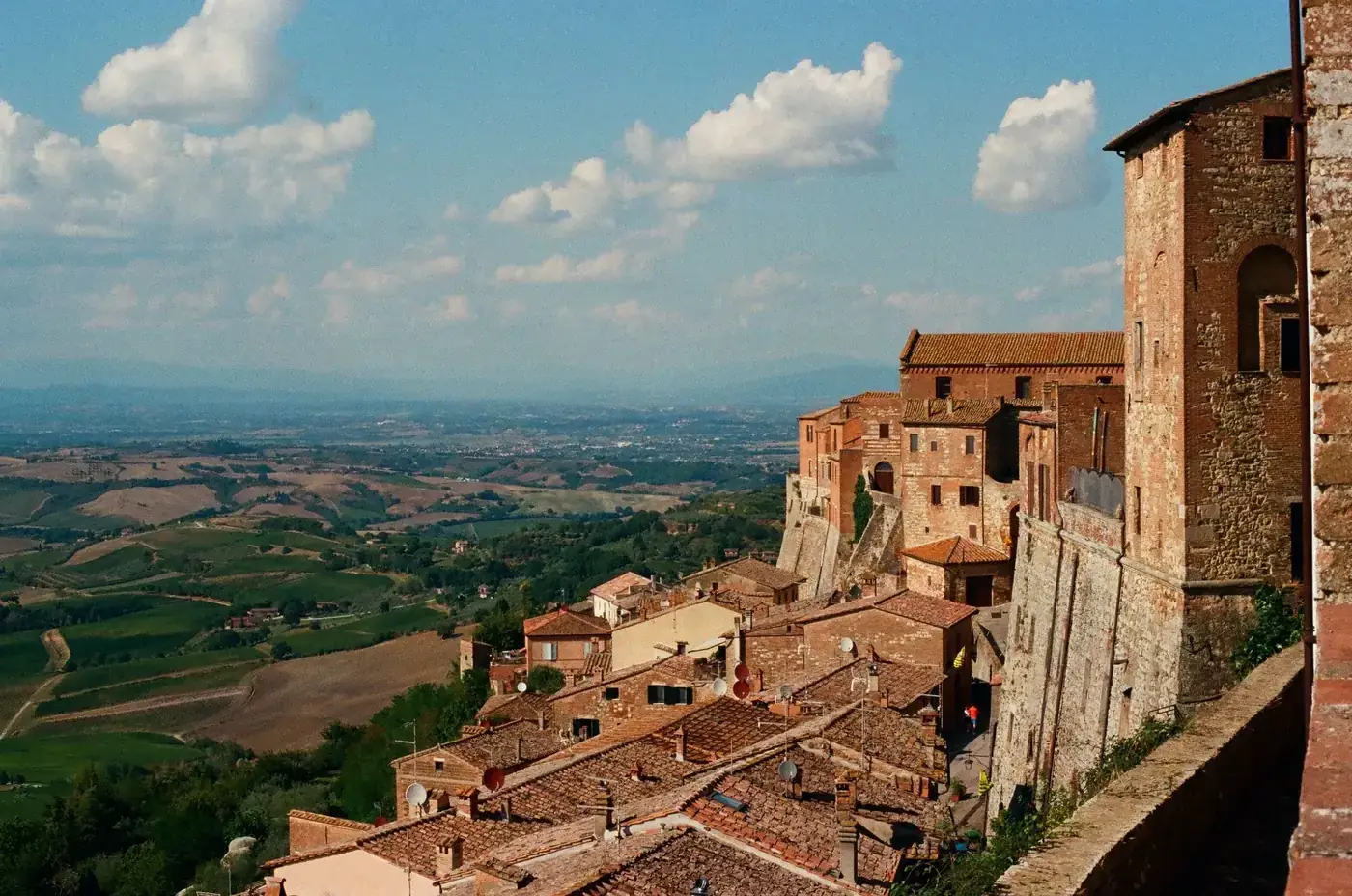 Breathtaking view over the rolling hills of Tuscany from a historic hilltop village.