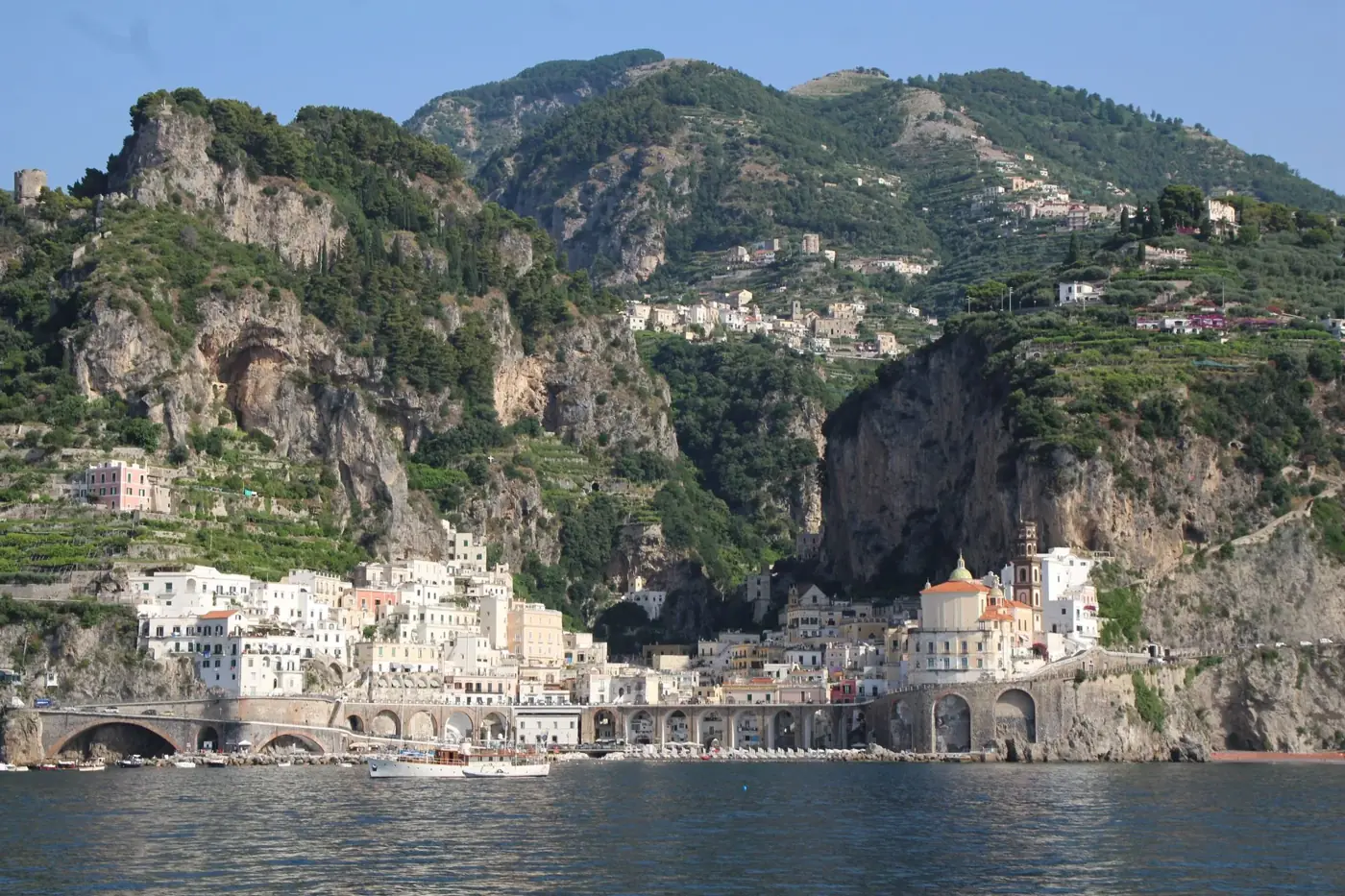 A picturesque town nestled by cliffs on the Amalfi Coast, Italy.