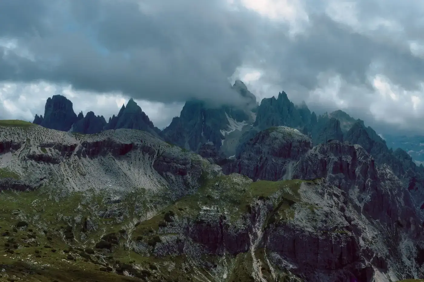 Breathtaking view of cloudy skies over rugged peaks in the Dolomites, Auronzo di Cadore.