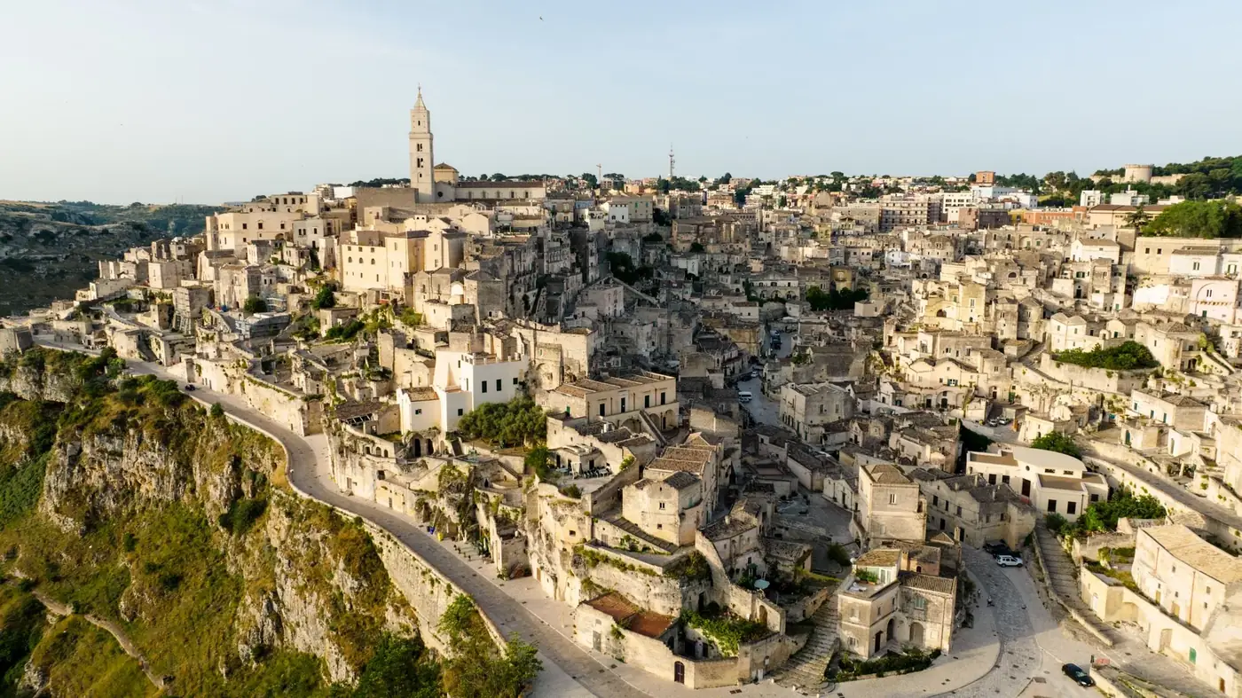 Stunning aerial view of a historic hillside town with ancient architecture and winding streets.