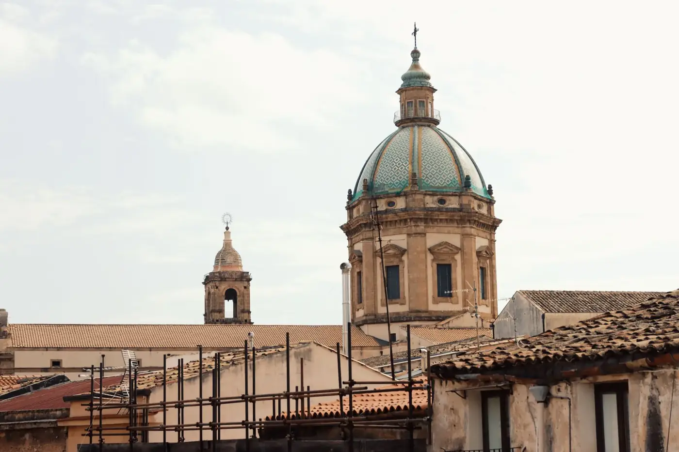 Beautiful view of a historic church dome in Palermo, Sicily, showcasing traditional architecture.