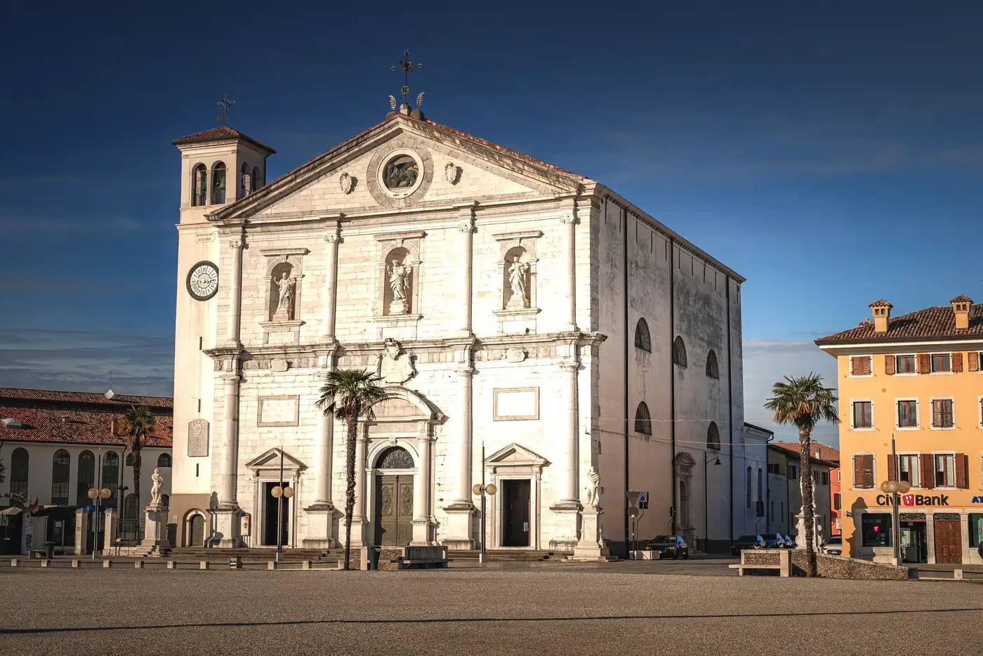 Elegant shot of the Palmanova Cathedral in Italy illuminated by soft daylight, showcasing historical architecture.