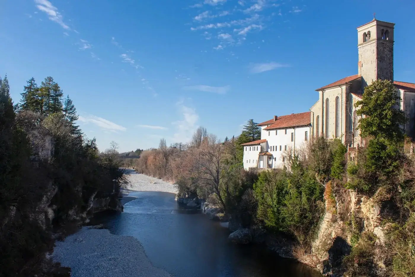 Breathtaking view of the river and historic architecture in Cividale del Friuli, Italy.