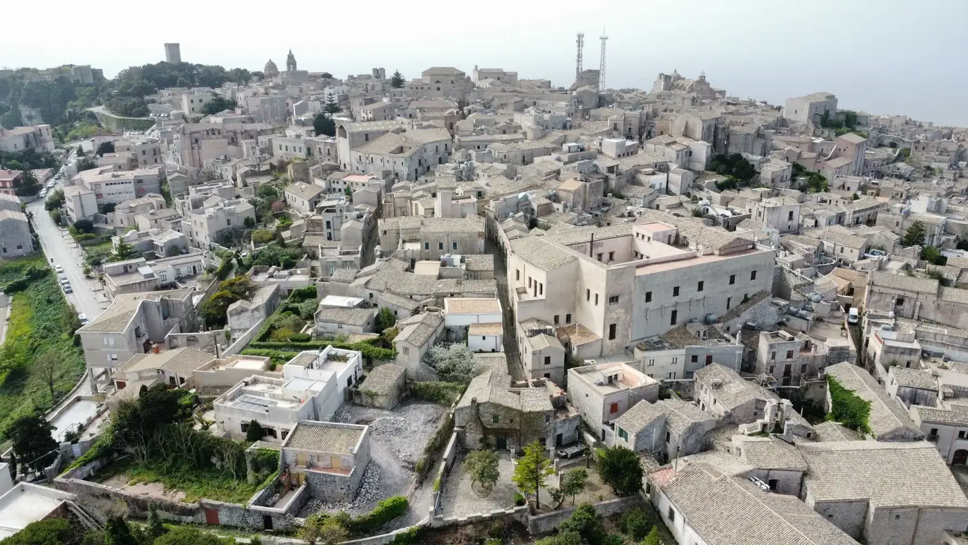 Aerial view of historic Erice, Sicily showcasing traditional stone architecture.