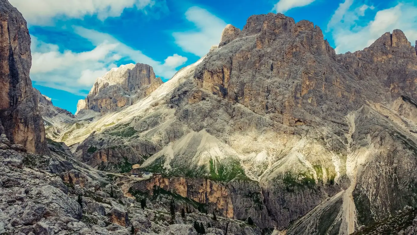 Majestic view of the Dolomites mountains under a bright summer sky in Italy.