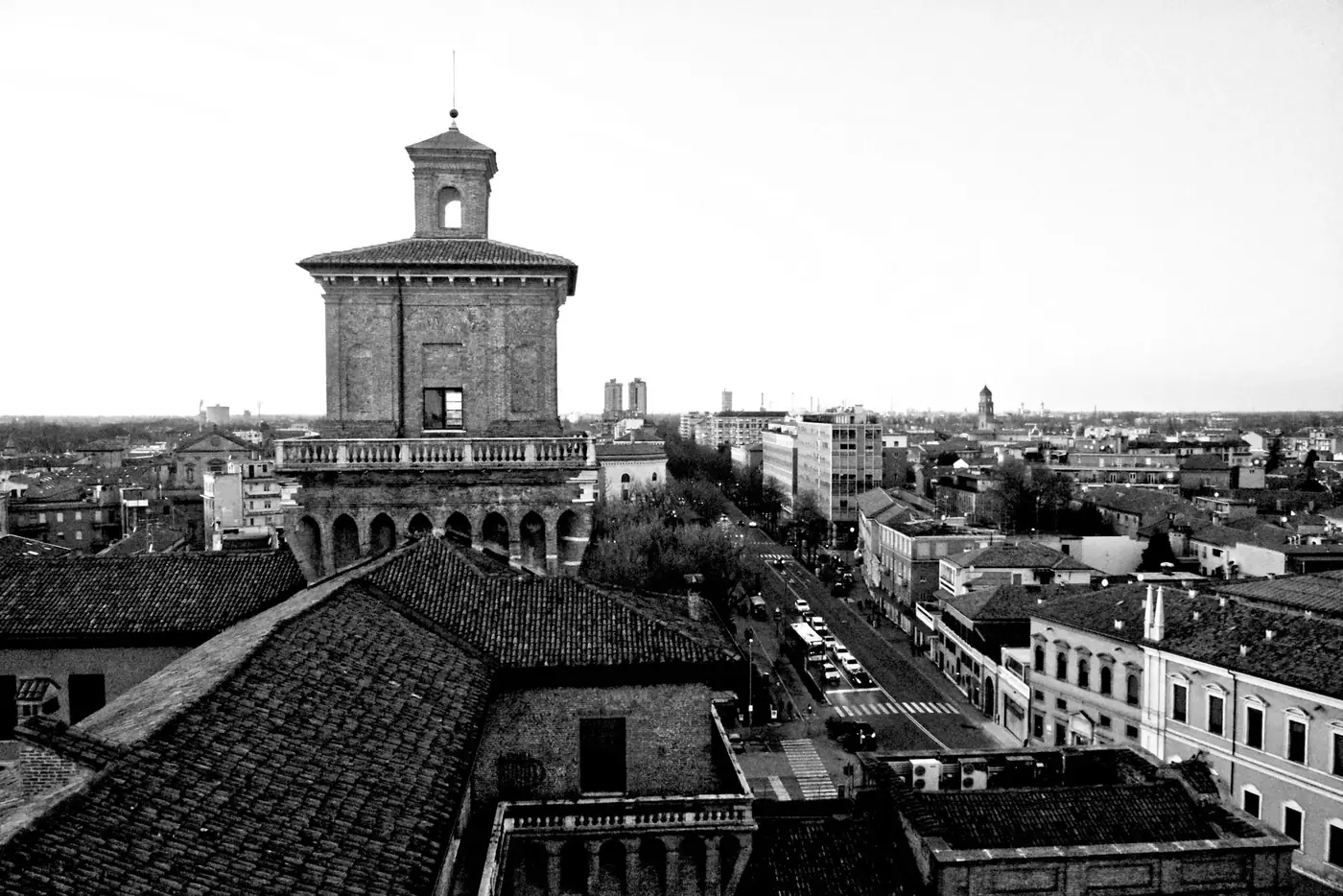 Black and white aerial view showcasing Ferrara's unique historic architecture and cityscape.