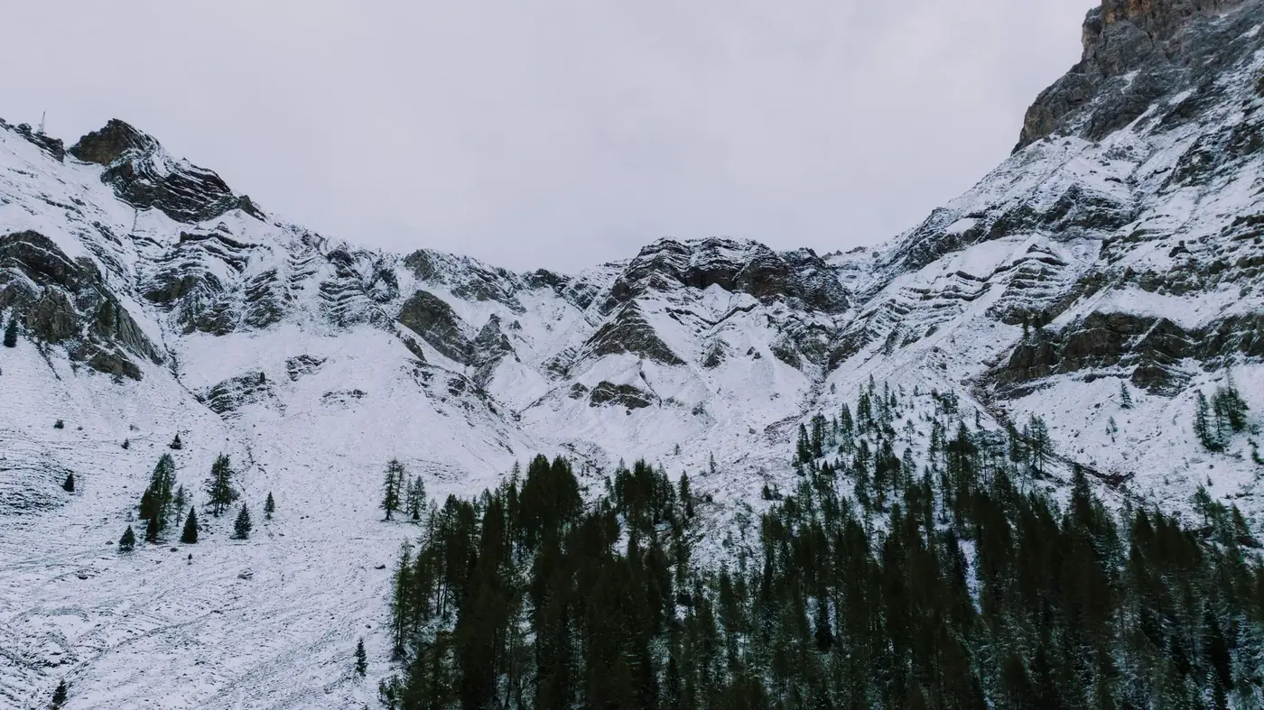 Beautiful snow-covered mountains in San Martino di Castrozza, Italy, showcasing the majestic Dolomites.