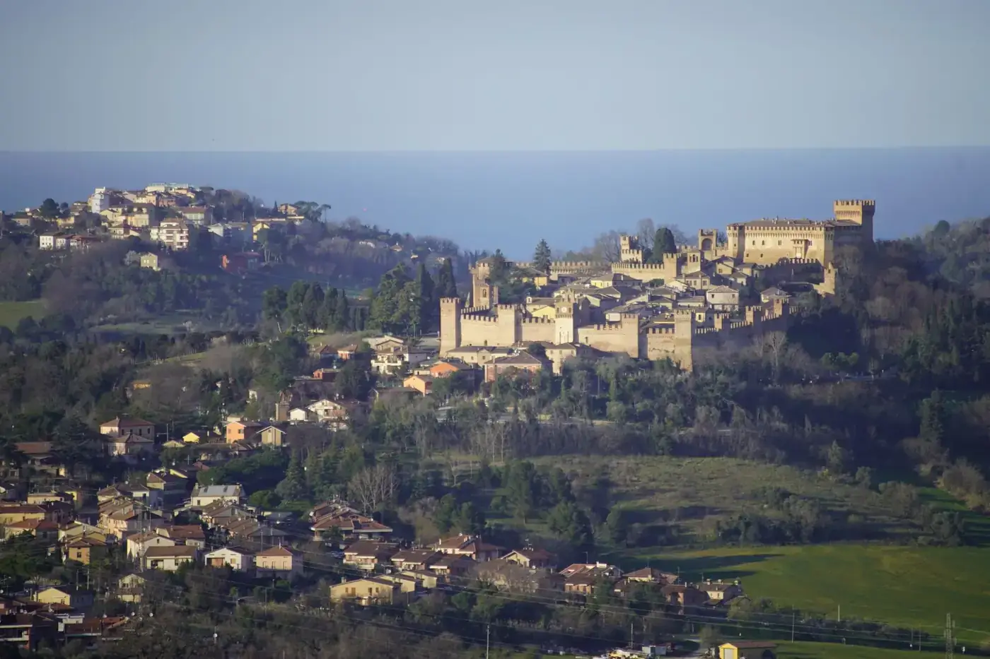 Explore the stunning Gradara Castle and its scenic coastal backdrop in Italy.