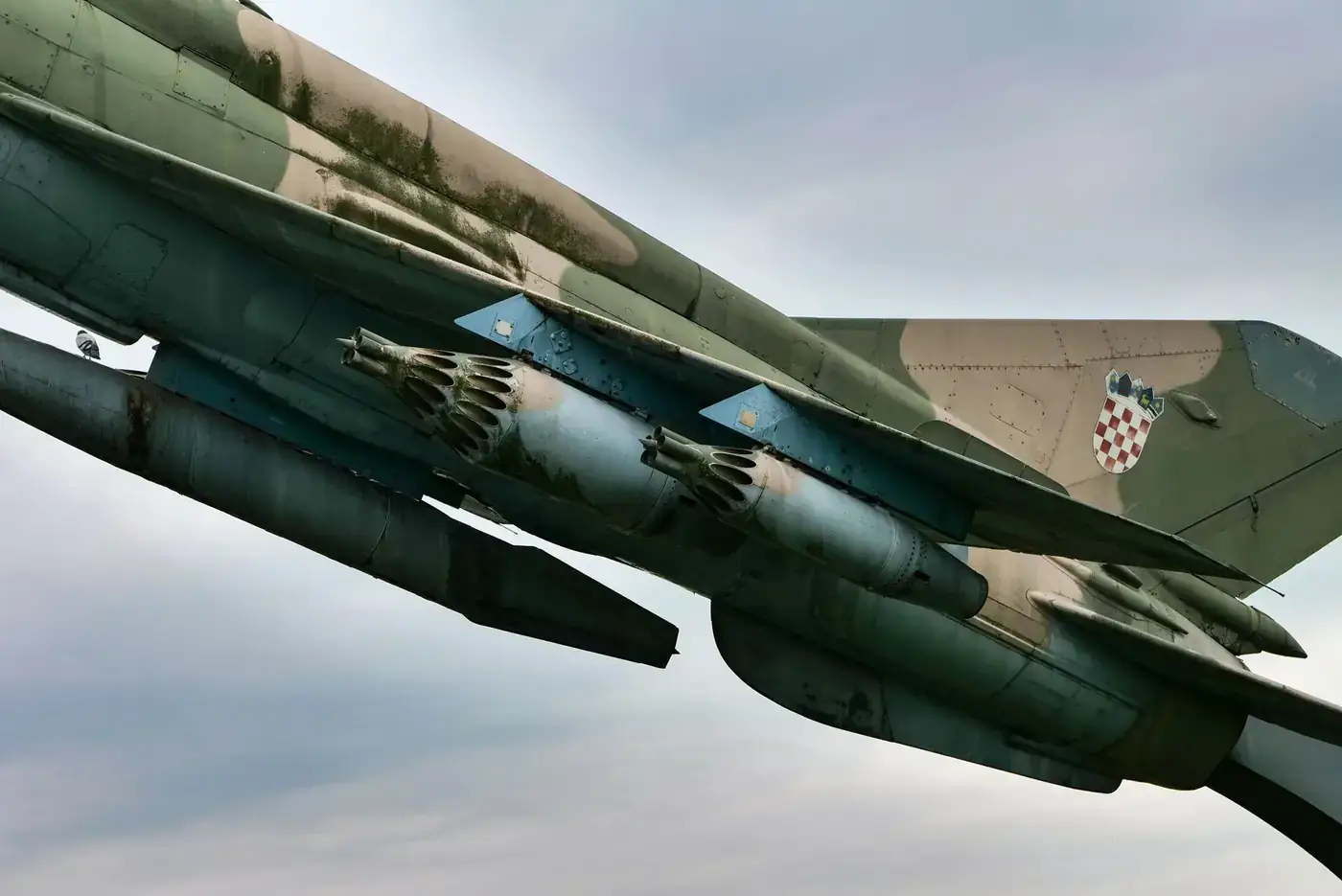 Close-up of a military jet fighter featuring a Croatian emblem, showcasing aviation detail.